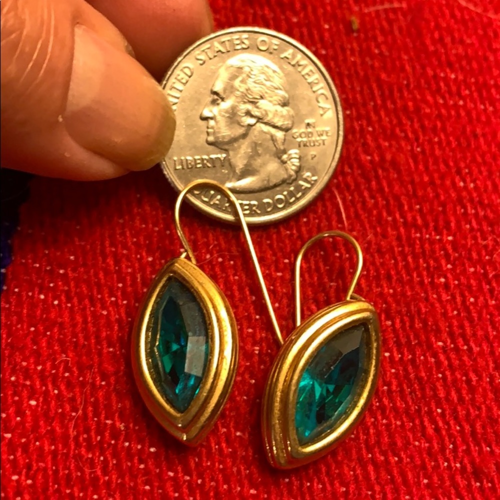 Green and gold colored earrings